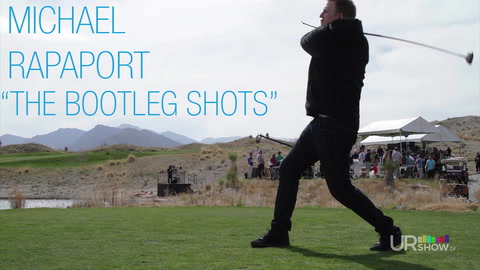 "Michael Rapaport practices his swing at the $10,000,000 Hole In One Challenge"